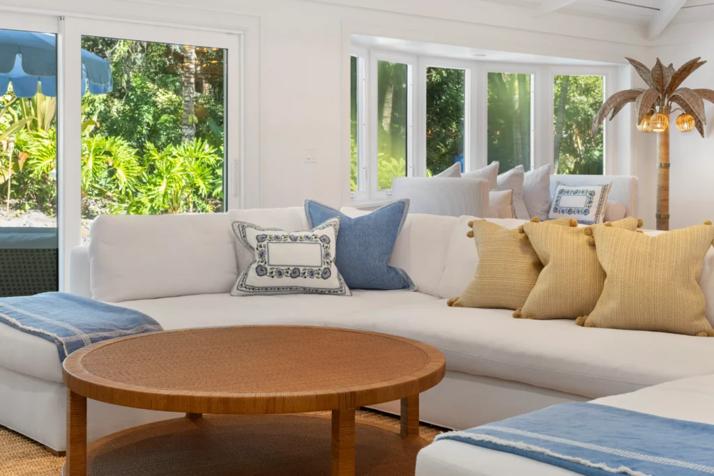 Living room photograph with sofa and pillows captured by seaside imagery the real estate photographer in Port St. Lucie for listing