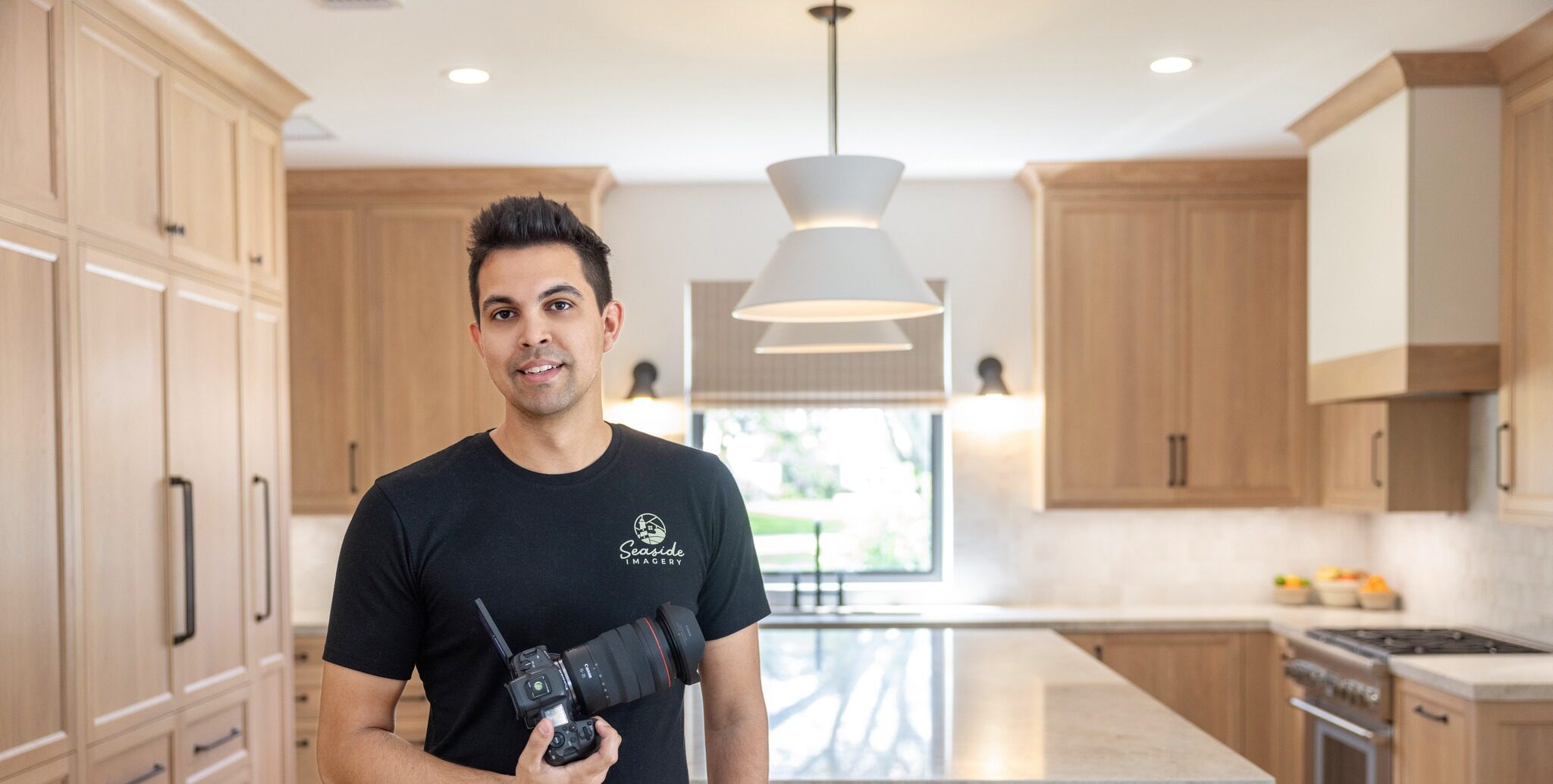 Matt Fulcher of seasideimagery holding a camera