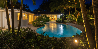 House with a swimming pool at night photograph by the seaside imagery the real estate photographer in Port St. Lucie